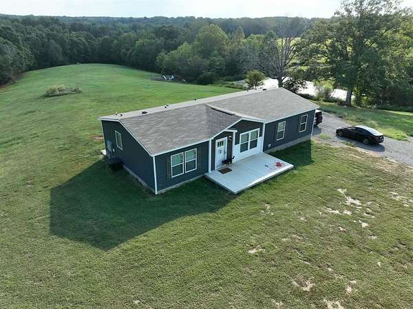 31.3 Acres of Agricultural Land with Home for Sale in Adolphus, Kentucky