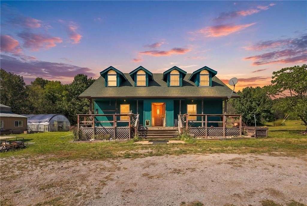 40 Acres of Land with Home for Sale in Archie, Missouri