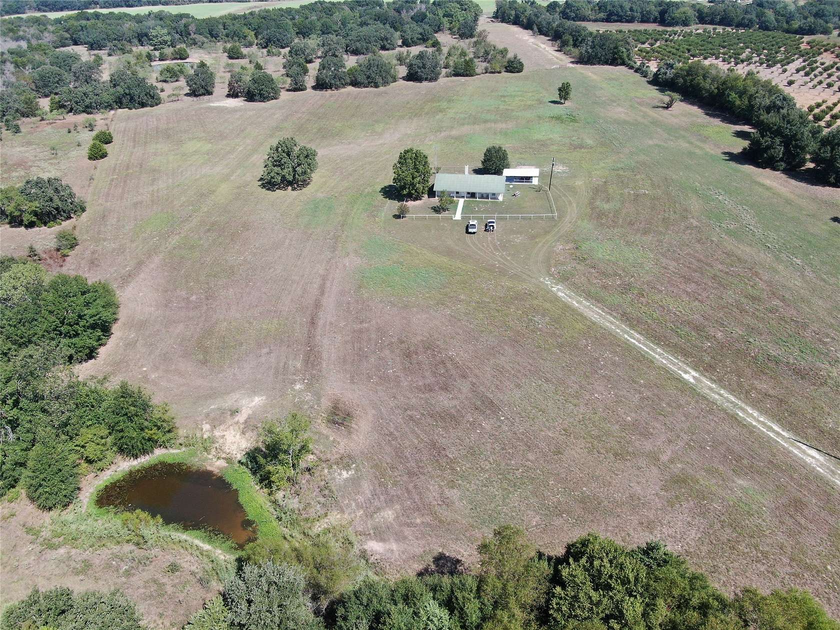 27.7 Acres of Agricultural Land with Home for Sale in Mexia, Texas