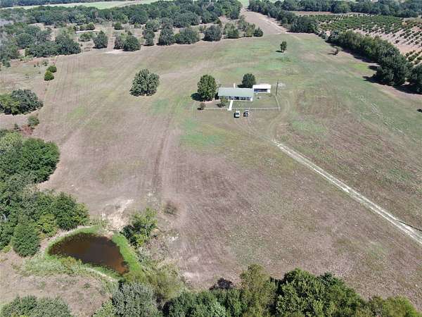 27.7 Acres of Agricultural Land with Home for Sale in Mexia, Texas