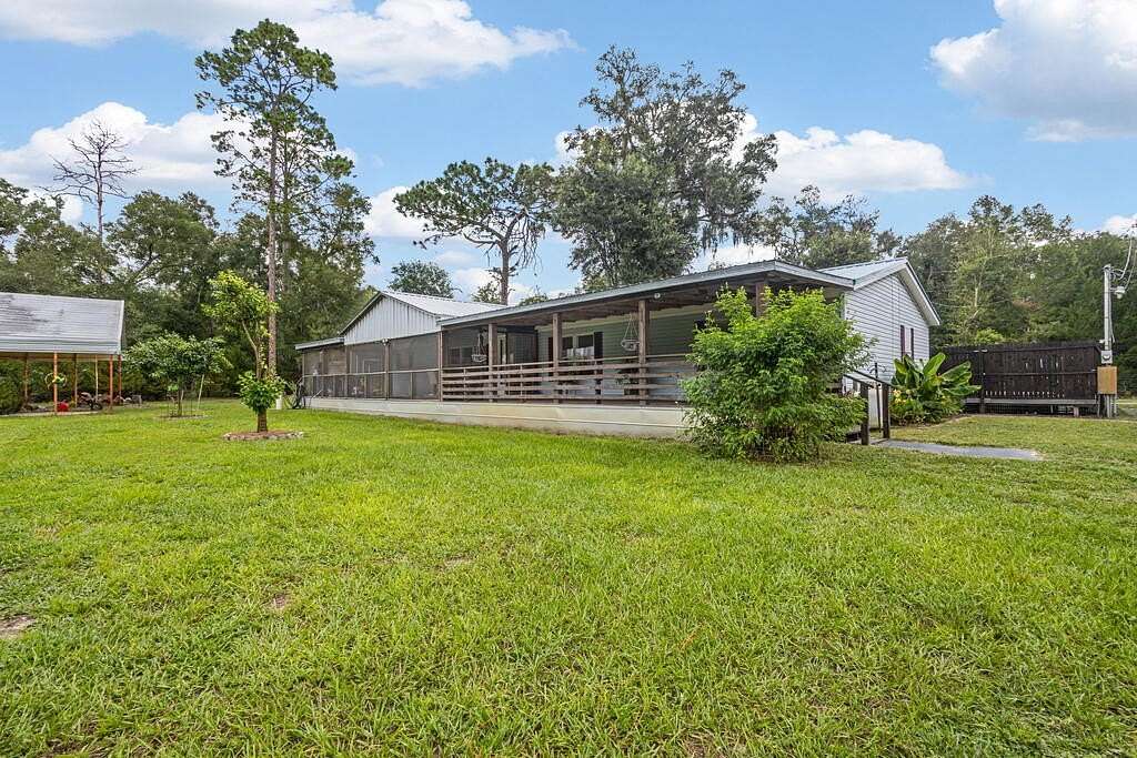 2.5 Acres of Land with Home for Sale in Chiefland, Florida