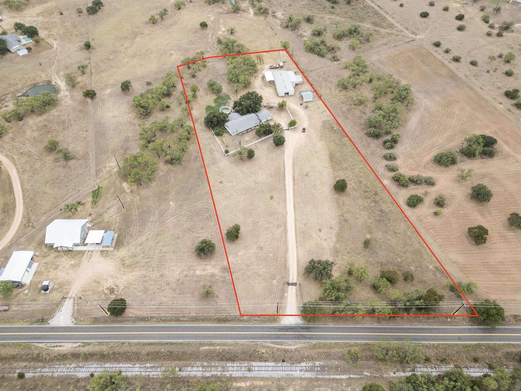 5 Acres of Land with Home for Sale in Marble Falls, Texas