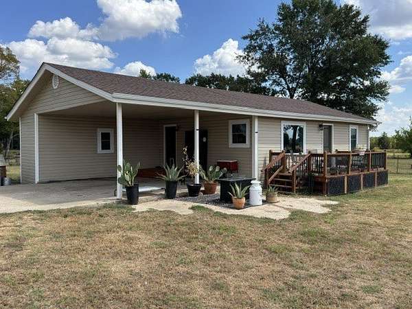 4.21 Acres of Land with Home for Sale in Leesburg, Texas