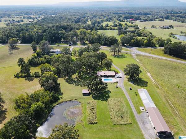 12 Acres of Land with Home for Sale in Rainbow City, Alabama