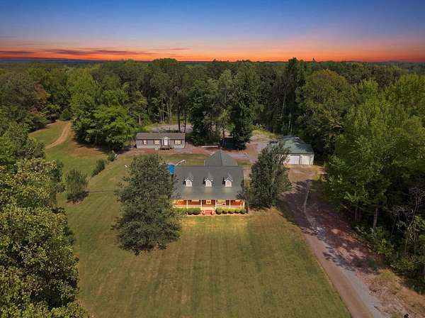 7 Acres of Land with Home for Sale in Mason, Tennessee