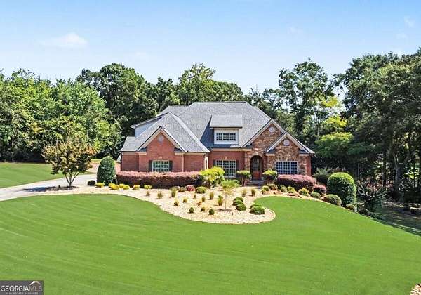 1.5 Acres of Land with Home for Sale in Hoschton, Georgia
