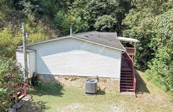 14 Acres of Land with Home for Sale in Delphia, Kentucky