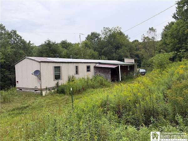 5.1 Acres of Land with Home for Sale in Cuba, New York