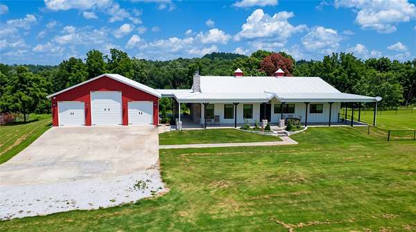 36.9 Acres of Recreational Land with Home for Sale in Gravette, Arkansas