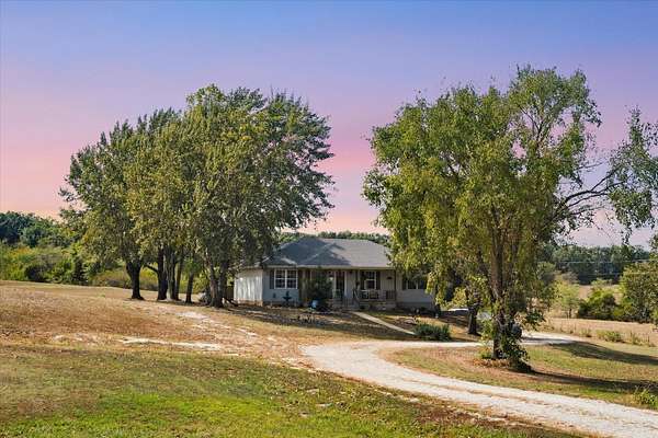 3.8 Acres of Land with Home for Sale in Halfway, Missouri
