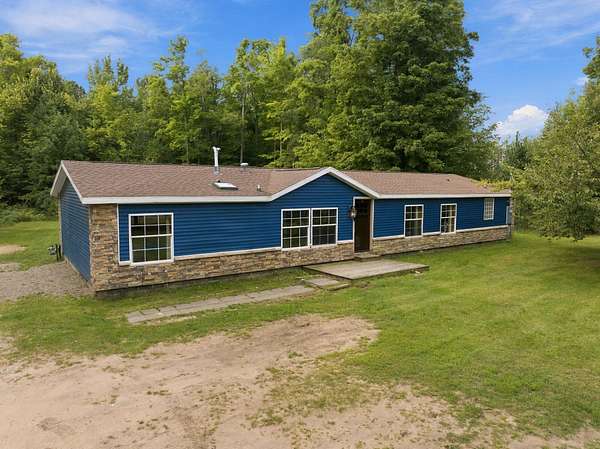 1.5 Acres of Land with Home for Sale in Cheboygan, Michigan