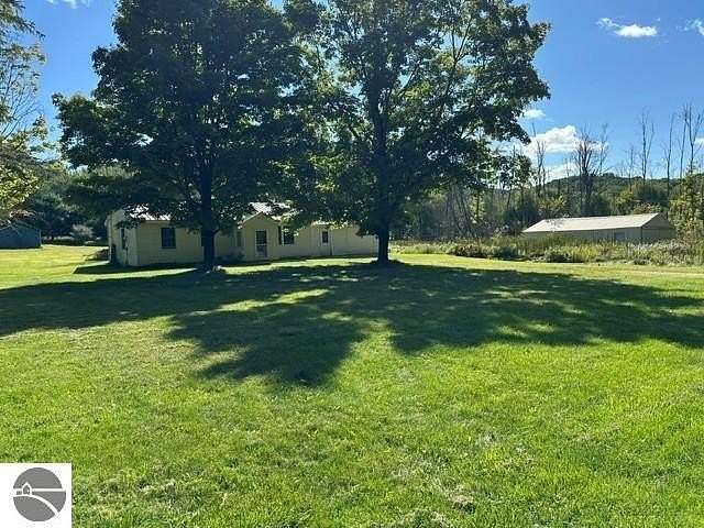 3.12 Acres of Land with Home for Sale in Central Lake, Michigan