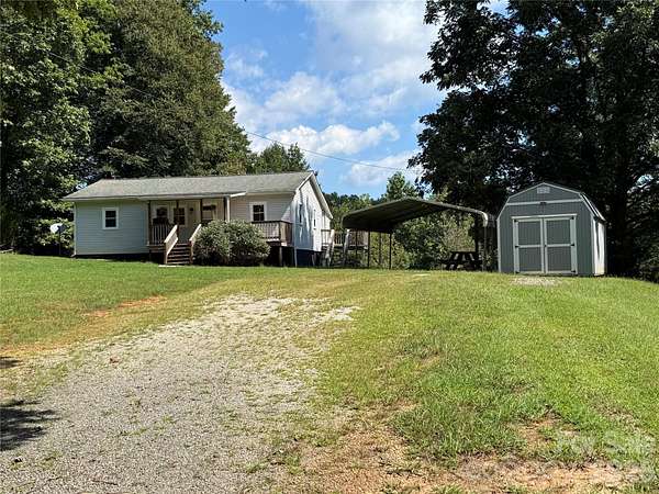 3.16 Acres of Land with Home for Sale in Nebo, North Carolina