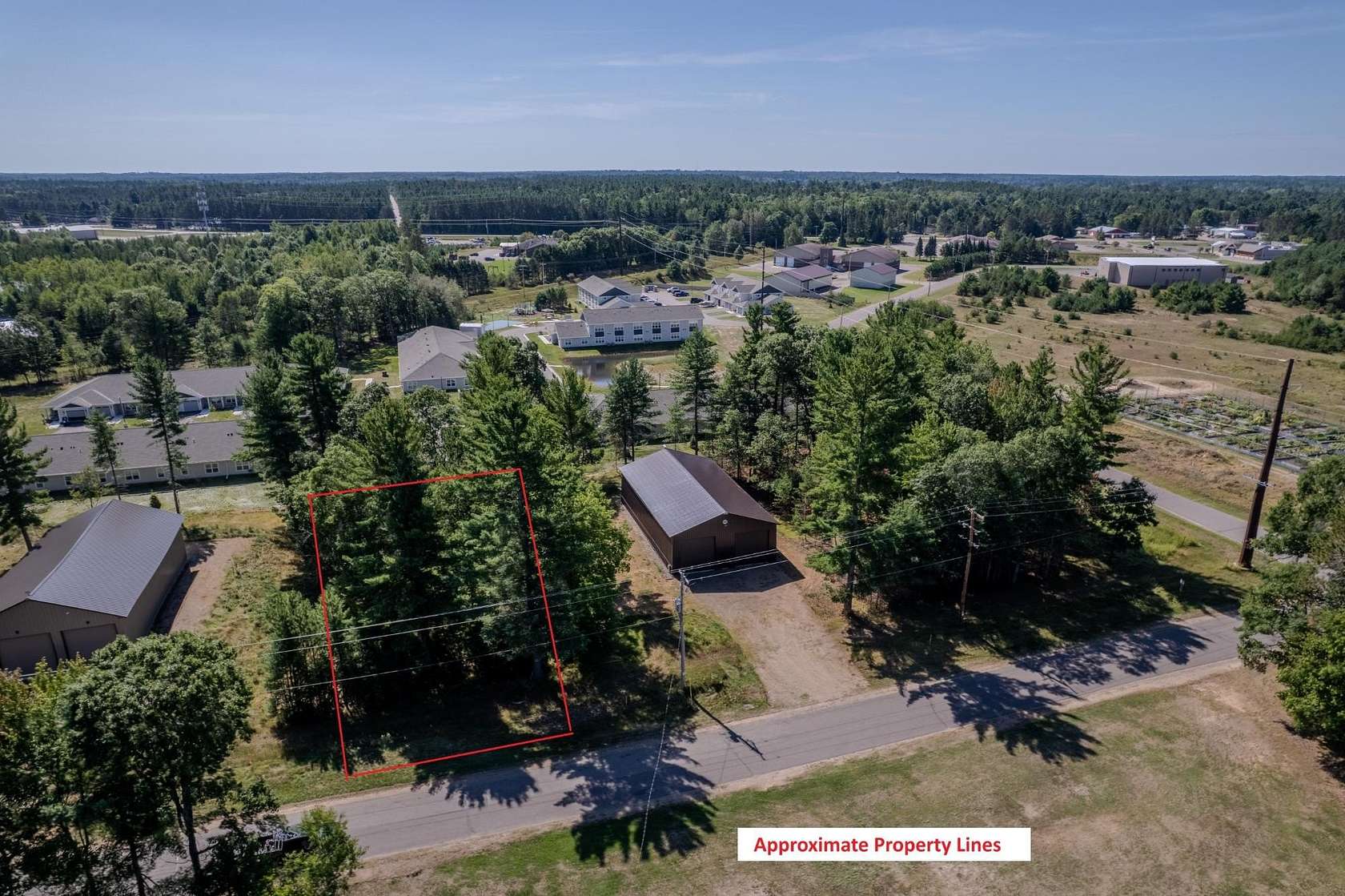 0.46 Acres of Commercial Land for Sale in Woodruff, Wisconsin