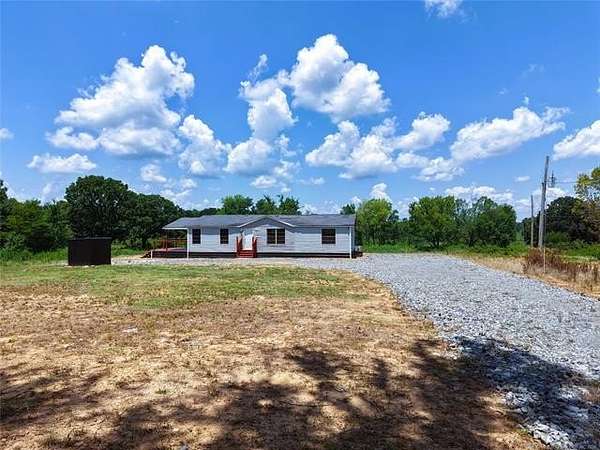 80 Acres of Land with Home for Sale in Shady Point, Oklahoma