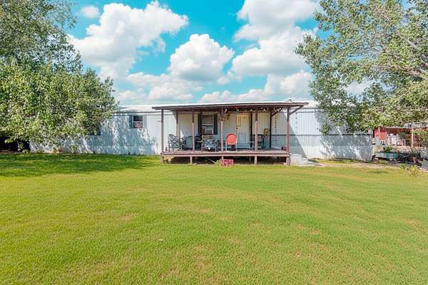 9.55 Acres of Land with Home for Sale in Pilot Point, Texas