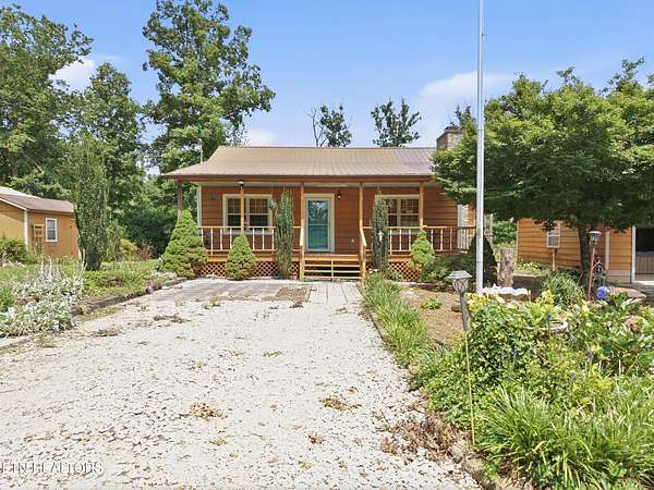 10.7 Acres of Recreational Land with Home for Sale in Deer Lodge, Tennessee