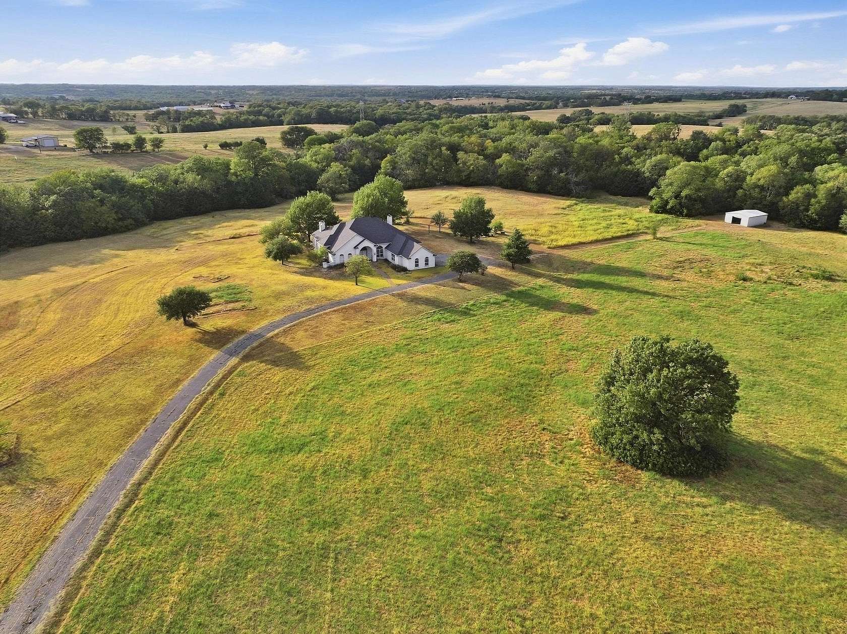 30.7 Acres of Land with Home for Sale in Whitewright, Texas