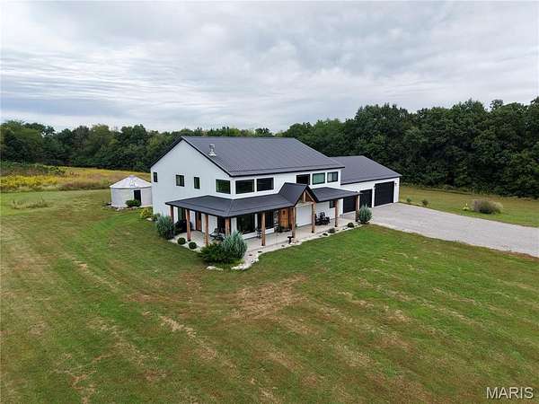 14.8 Acres of Land with Home for Sale in New London, Missouri