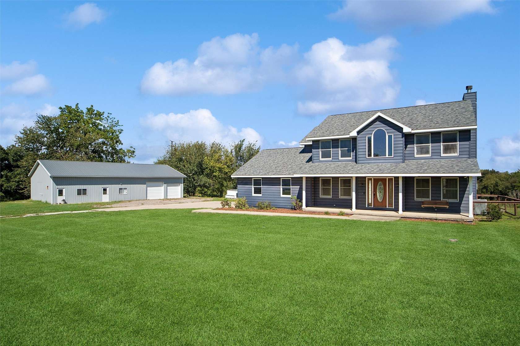 14.6 Acres of Land with Home for Sale in Norwalk, Iowa