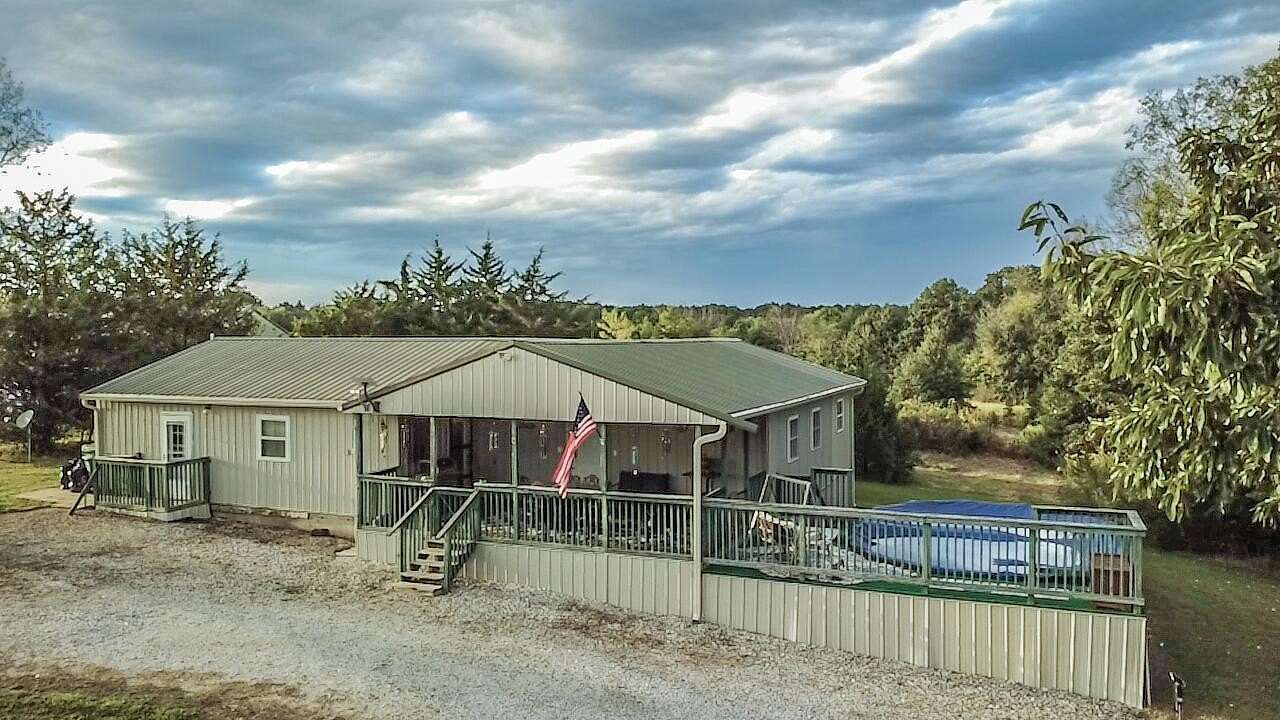 10 Acres of Land with Home for Sale in Stoutsville, Missouri