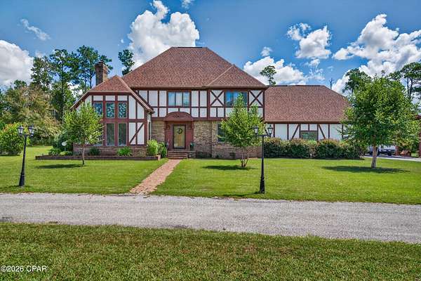 5.8 Acres of Land with Home for Sale in Marianna, Florida