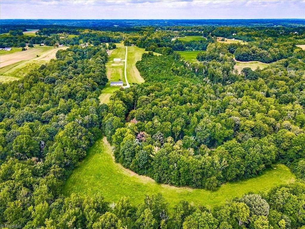 45.6 Acres of Land with Home for Sale in Gibsonville, North Carolina
