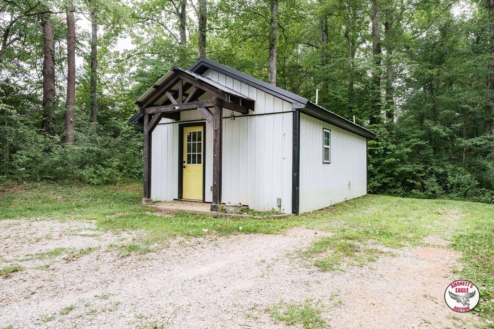 1.64 Acres of Land with Home for Auction in Byrdstown, Tennessee