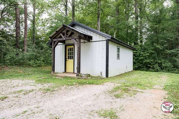1.64 Acres of Land with Home for Auction in Byrdstown, Tennessee