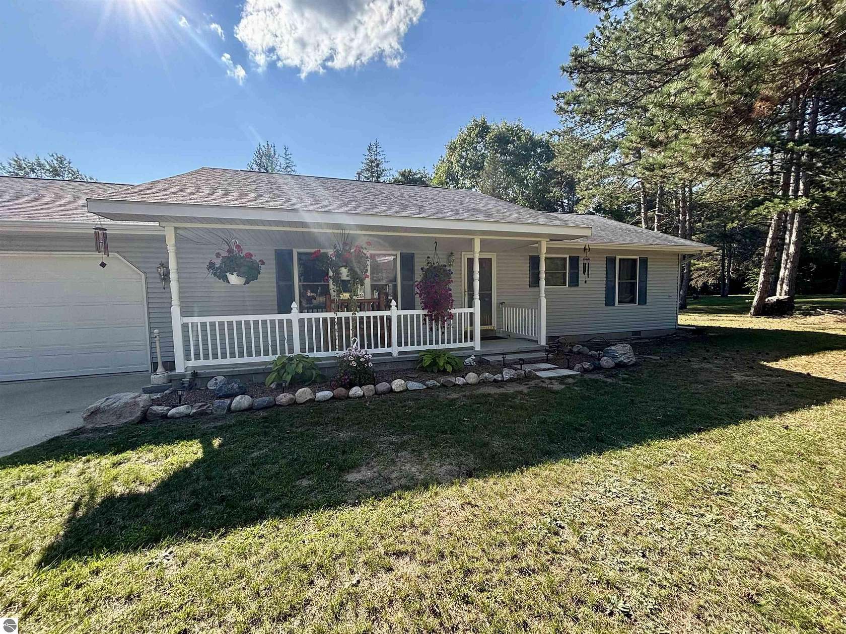 1.5 Acres of Land with Home for Sale in Farwell, Michigan