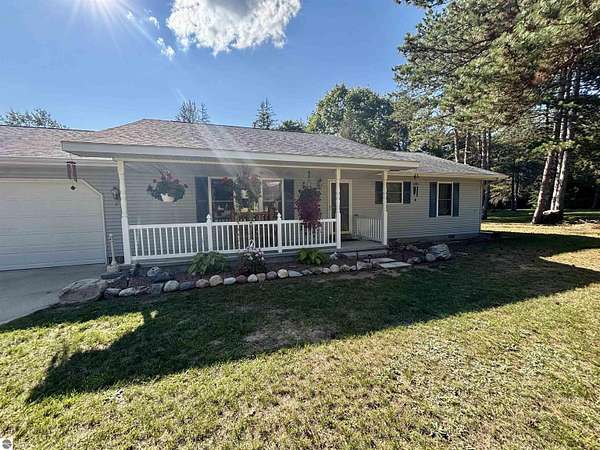 1.5 Acres of Land with Home for Sale in Farwell, Michigan