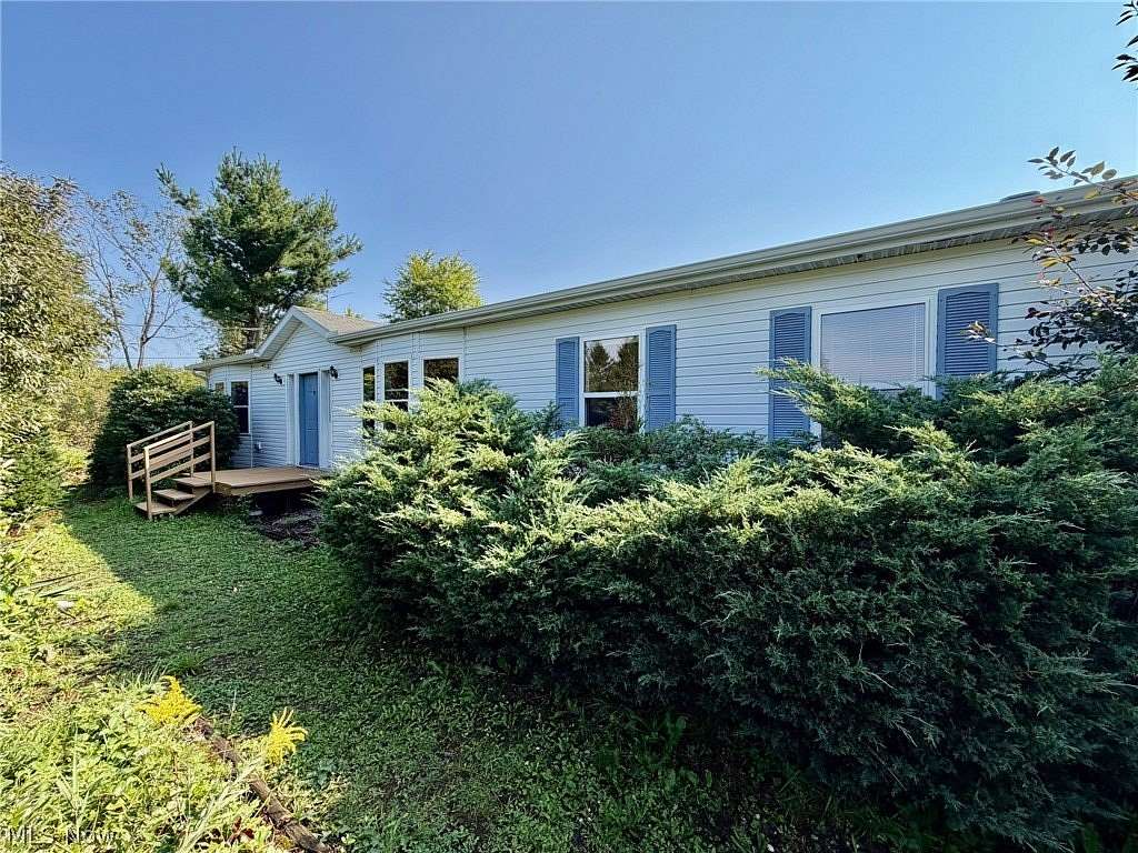 3 Acres of Land with Home for Auction in Newbury Township, Ohio