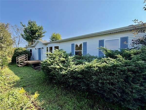 3 Acres of Land with Home for Auction in Newbury Township, Ohio