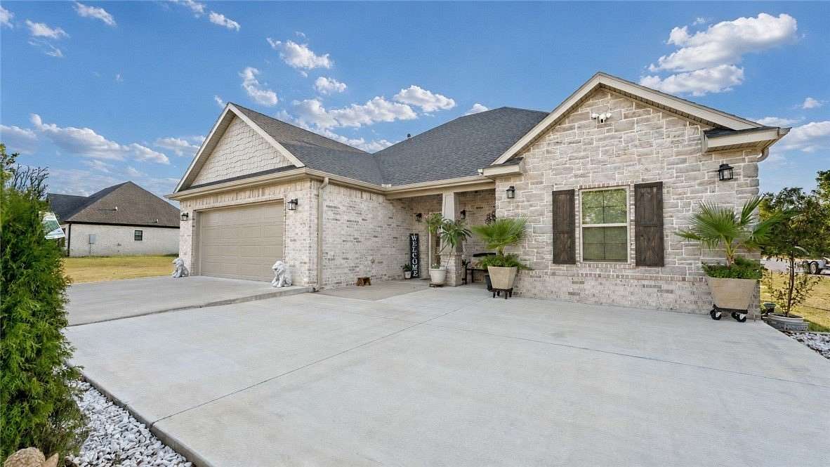 1.5 Acres of Land with Home for Sale in Rogers, Arkansas