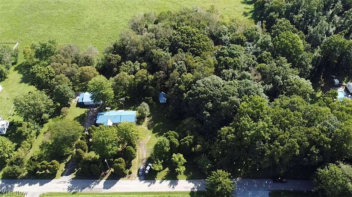 3 Acres of Land with Home for Sale in East Rochester, Ohio