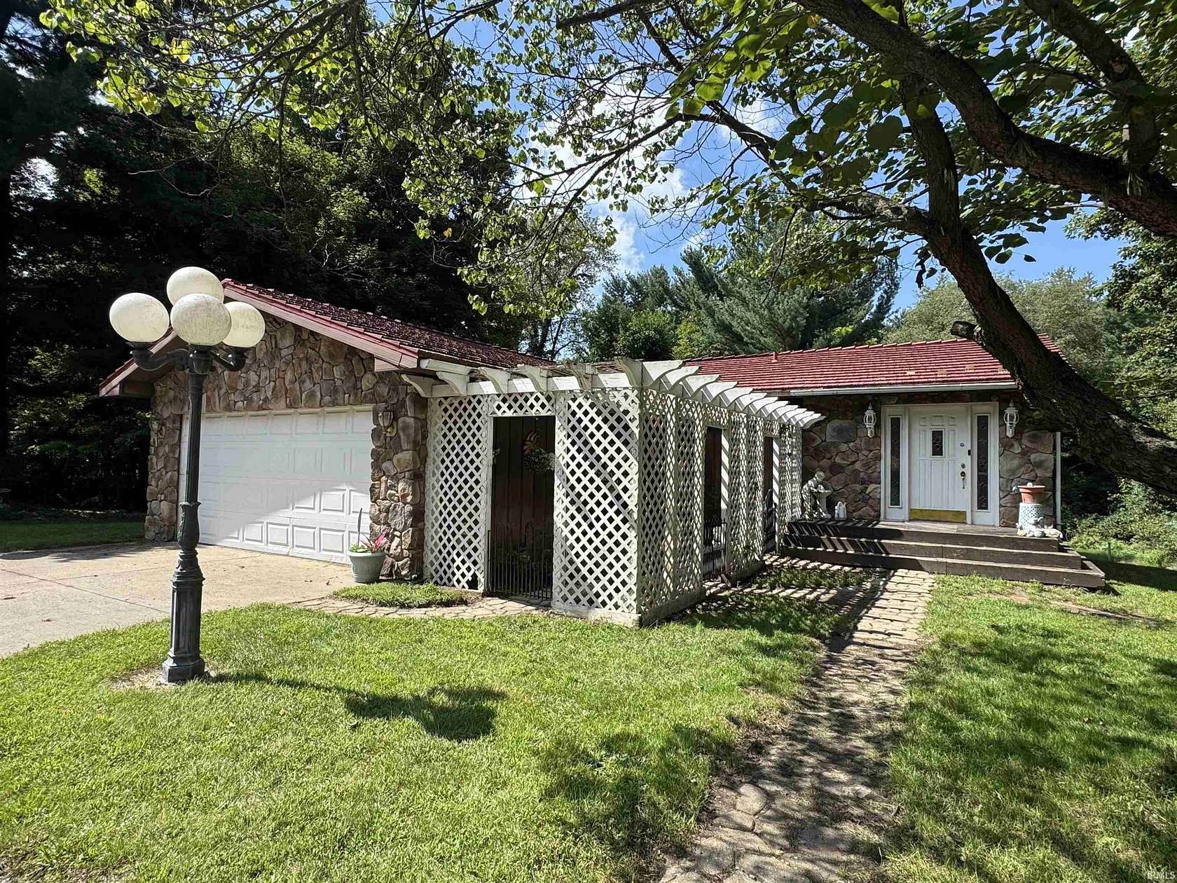 5.2 Acres of Land with Home for Auction in Bristol, Indiana