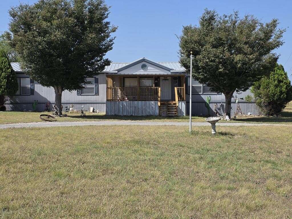 2.5 Acres of Land with Home for Sale in Center Point, Texas