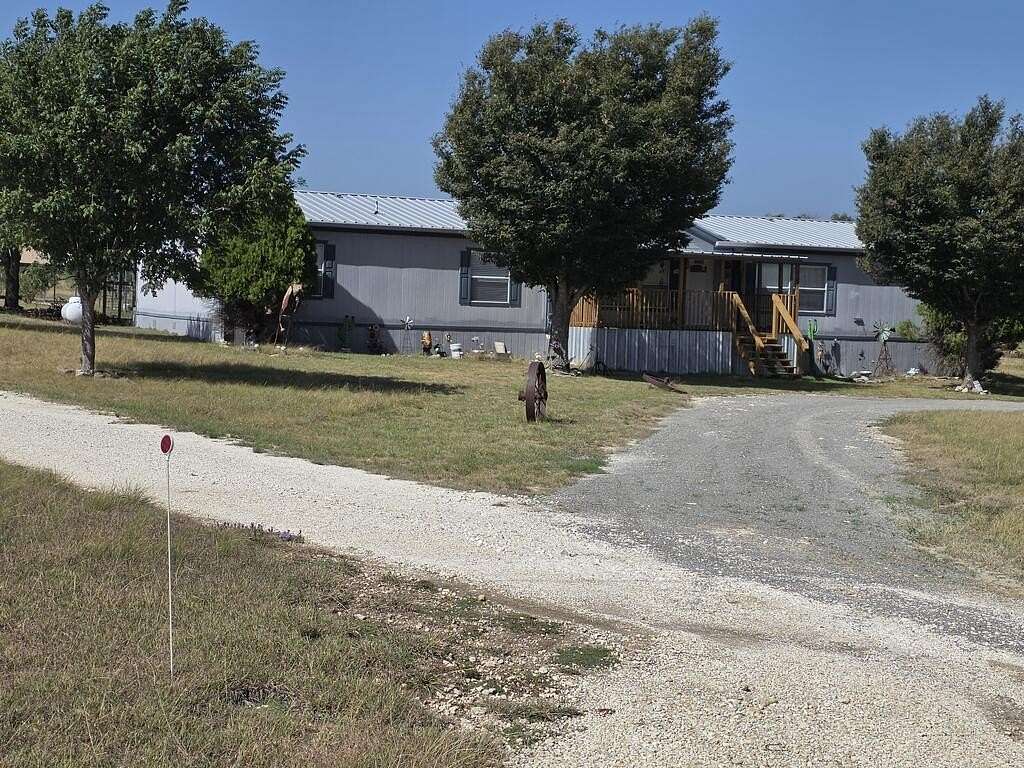 2.5 Acres of Land with Home for Sale in Center Point, Texas