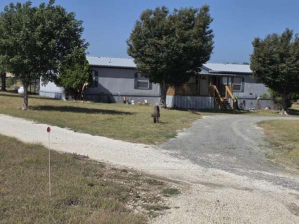2.5 Acres of Land with Home for Sale in Center Point, Texas