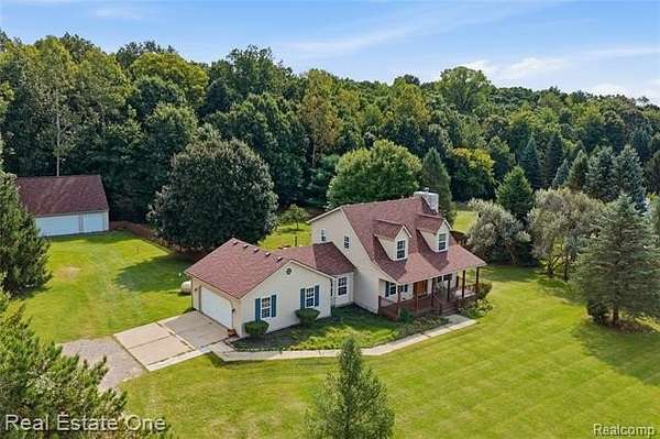 2 Acres of Land with Home for Sale in Marion Township, Michigan