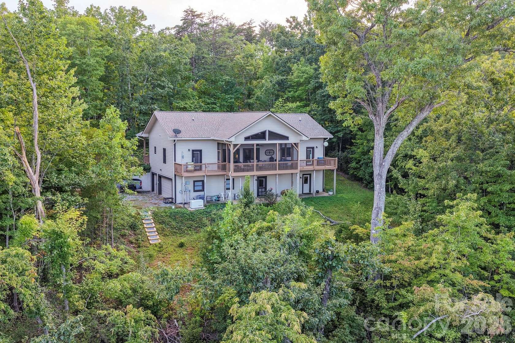 5.75 Acres of Land with Home for Sale in Lake Lure, North Carolina