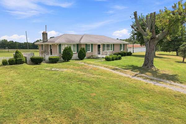 1.55 Acres of Land with Home for Sale in Cottontown, Tennessee