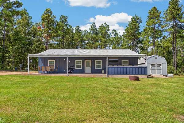 22.5 Acres of Recreational Land with Home for Sale in Crockett, Texas