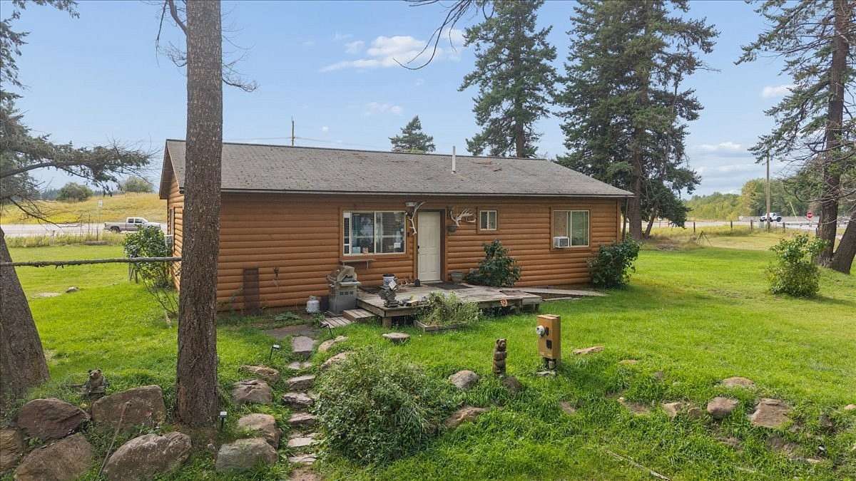 12.6 Acres of Land with Home for Sale in Columbia Falls, Montana