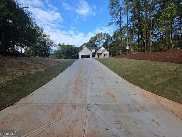 3 Acres of Land with Home for Sale in Jackson, Georgia