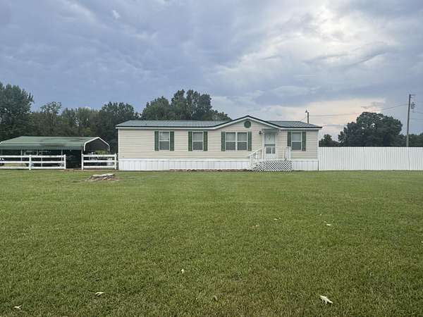 6 Acres of Land with Home for Sale in Sardis, Mississippi
