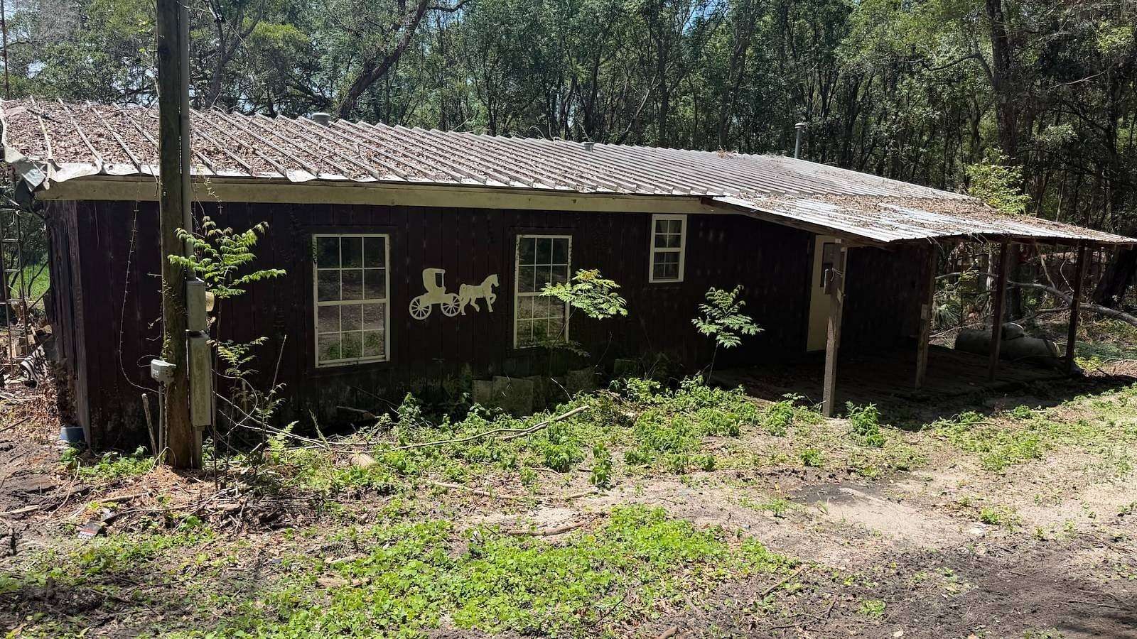 3 Acres of Land with Home for Sale in Weirsdale, Florida