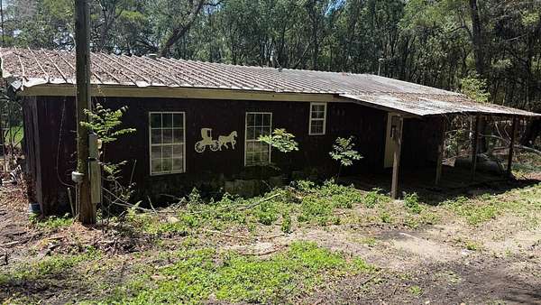 3 Acres of Land with Home for Sale in Weirsdale, Florida