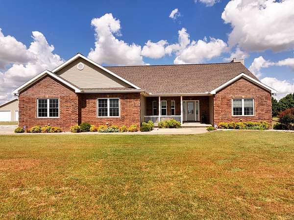 40 Acres of Land with Home for Sale in Liberal, Missouri
