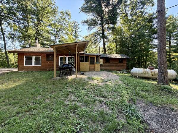 20 Acres of Recreational Land with Home for Sale in Luther, Michigan